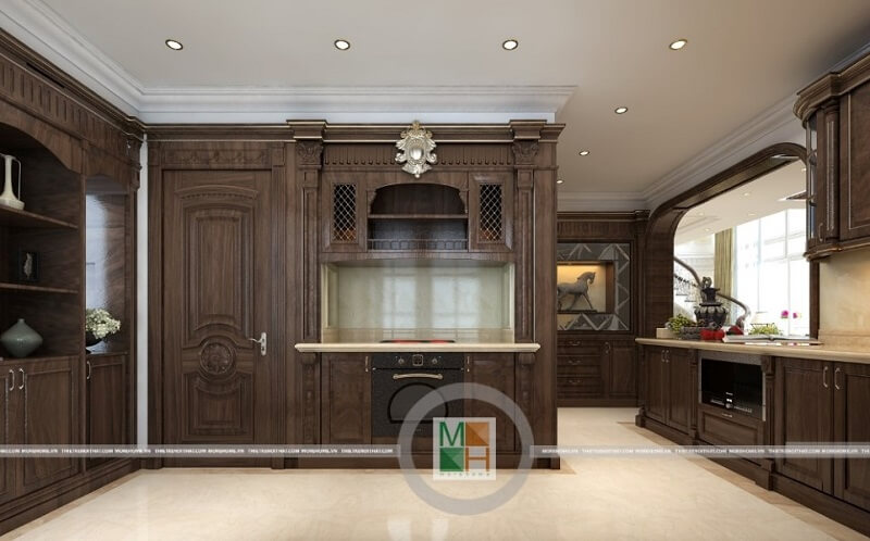 Thiết kế phòng bếp chung cư đẹp có hệ tủ bếp gỗ tự nhiên nâu trầm với kiểu dáng tinh tế, nghệ thuật mang đến vẻ đẹp sang trọng, đẳng cấp cho căn phòng. Thiết kế phòng bếp, tủ bếp đẹp