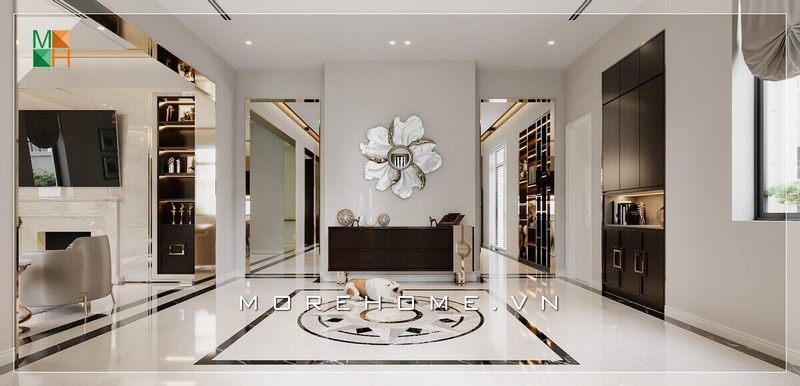 Ở khu vực ra vào, KTS Morehome thiết kế một tủ để đồ bằng gỗ công nghiệp cao cấp, để khách đến chơi có chỗ để cất giữ giày dép, giúp khu vực này luôn được gọn gàng ngăn nắp